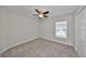 Bedroom with ceiling fan and window at 16903 Peaceful Valley Dr, Wimauma, FL 33598