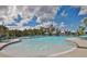 Large community pool with shallow water features at 16903 Peaceful Valley Dr, Wimauma, FL 33598