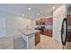 Modern kitchen with stainless steel appliances and an island at 16903 Peaceful Valley Dr, Wimauma, FL 33598