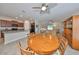 Open concept dining room adjacent to kitchen and living room at 16903 Peaceful Valley Dr, Wimauma, FL 33598
