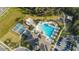 Community pool with tennis courts and playground at 16903 Peaceful Valley Dr, Wimauma, FL 33598