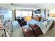 Comfortable living room with leather furniture and coastal decor at 100 Bluff View Dr # 605A, Belleair Bluffs, FL 33770