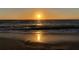 Beautiful sunset over the ocean and beach at 100 Bluff View Dr # 605A, Belleair Bluffs, FL 33770