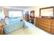 Spacious main bedroom with a comfortable bed and plenty of closet space at 100 Bluff View Dr # 605A, Belleair Bluffs, FL 33770