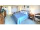 Spacious main bedroom with a comfortable bed and plenty of closet space at 100 Bluff View Dr # 605A, Belleair Bluffs, FL 33770
