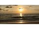 Golden hour sunset reflecting on the ocean at 100 Bluff View Dr # 605A, Belleair Bluffs, FL 33770