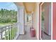 Private balcony with white railings, offering a view of the community at 19300 Lonesome Pine Dr, Land O Lakes, FL 34638
