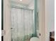Bathroom with shower/tub combo and floral shower curtain at 19300 Lonesome Pine Dr, Land O Lakes, FL 34638