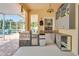 Outdoor kitchen features stainless steel appliances and a built-in grill at 19300 Lonesome Pine Dr, Land O Lakes, FL 34638