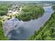 Stunning aerial view of a tranquil lake at 19300 Lonesome Pine Dr, Land O Lakes, FL 34638