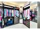 Spacious walk-in closet with custom shelving and drawers at 19300 Lonesome Pine Dr, Land O Lakes, FL 34638