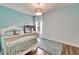 Charming bedroom with white bed frame and light blue walls at 19300 Lonesome Pine Dr, Land O Lakes, FL 34638