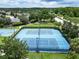 Two tennis courts and a basketball court at 19300 Lonesome Pine Dr, Land O Lakes, FL 34638