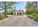 Gated community entrance with guard house at 19300 Lonesome Pine Dr, Land O Lakes, FL 34638