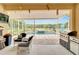 Relaxing patio with wicker chairs overlooking a refreshing pool at 19300 Lonesome Pine Dr, Land O Lakes, FL 34638