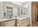 Bathroom features a vanity with sink and a shower at 4137 Edgewood Dr, Holiday, FL 34691