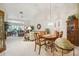 Elegant dining room with a large wooden table at 4137 Edgewood Dr, Holiday, FL 34691