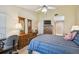 Spacious bedroom with a double bed, dresser, and built in armoire at 4137 Edgewood Dr, Holiday, FL 34691