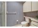 Bathroom with shower and toilet, updated decor at 4137 Edgewood Dr, Holiday, FL 34691