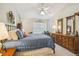 Spacious Primary bedroom with ample light and built-in dresser at 4137 Edgewood Dr, Holiday, FL 34691