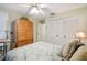 Spacious bedroom with large closet and a ceiling fan at 4137 Edgewood Dr, Holiday, FL 34691