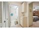 Hallway with linen closet and bathroom access at 4137 Edgewood Dr, Holiday, FL 34691