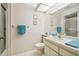 Clean bathroom with single sink vanity and shower/tub combo at 4137 Edgewood Dr, Holiday, FL 34691