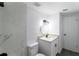 Bright bathroom featuring modern fixtures, tile, and a white vanity at 3432 Danny Bryan Blvd, Tampa, FL 33619