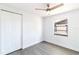Clean bedroom with a closet, window, and neutral color palette at 3432 Danny Bryan Blvd, Tampa, FL 33619