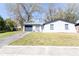 Charming single-story home features a well-maintained front yard and attached garage at 3432 Danny Bryan Blvd, Tampa, FL 33619