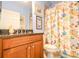 Charming bathroom with granite countertop and a shower/tub combo at 16252 Amethyst Key Dr, Wimauma, FL 33598