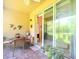 Relaxing patio with brick flooring and plenty of plants at 16252 Amethyst Key Dr, Wimauma, FL 33598