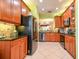 Spacious kitchen with ample cabinet space and granite counters at 16252 Amethyst Key Dr, Wimauma, FL 33598