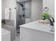 Clean bathroom with soaking tub and walk-in shower at 2624 Society Dr, Holiday, FL 34691