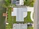 Overhead view of house and backyard with private dock at 2624 Society Dr, Holiday, FL 34691