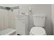 Updated bathroom with pedestal sink and shower at 2624 Society Dr, Holiday, FL 34691