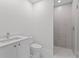 This bathroom offers a stylish vanity, modern toilet and a glass shower at 2910 W Barcelona St # 903, Tampa, FL 33629