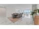 Bright, spacious dining area with marble floors, seating for eight, and an open layout at 2910 W Barcelona St # 903, Tampa, FL 33629