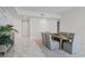 Bright dining room features modern decor, seating for eight, and elegant marble floors at 2910 W Barcelona St # 903, Tampa, FL 33629