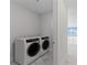 Laundry room featuring a modern washer and dryer at 2910 W Barcelona St # 903, Tampa, FL 33629