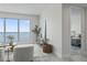 Bright living room with marble floors, ocean view, and stylish decor at 2910 W Barcelona St # 903, Tampa, FL 33629