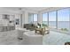 Elegant living room with white seating, modern décor, and waterfront views at 2910 W Barcelona St # 903, Tampa, FL 33629