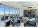 Bright and airy resident lounge area with plush seating, bar and sweeping city views at 2910 W Barcelona St # 903, Tampa, FL 33629
