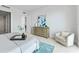 Spacious main bedroom with accent chair, carpet, and ocean view at 2910 W Barcelona St # 903, Tampa, FL 33629
