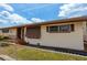 Ranch style home exterior with brown accents at 4904 N Habana Ave, Tampa, FL 33614