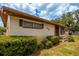 House exterior showcasing brown roof and landscaping at 4904 N Habana Ave, Tampa, FL 33614