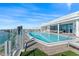 Large rooftop pool with surrounding lounge chairs and city views at 2910 W Barcelona St # 903, Tampa, FL 33629