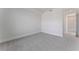 Bright bedroom with grey carpet and access to bathroom at 2910 W Barcelona St # 903, Tampa, FL 33629