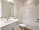 Clean bathroom with white subway tiles and bathtub at 11218 Rustic Timber Loop, San Antonio, FL 33576