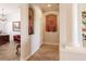 Elegant hallway with decorative niches and neutral color palette at 225 Pesaro Dr, North Venice, FL 34275